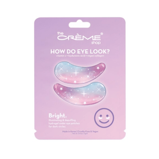 Pack of under eye patches with stars on blue/purple/pink gradient pattern with a purple packaging from 'The Crème Shop' on a white background.