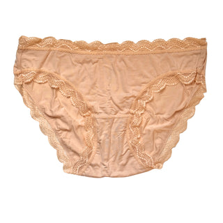 Beige lace-trimmed beige underwear on a white/grey background